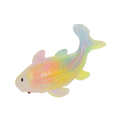 Iridescent fish-shaped object on a white background
