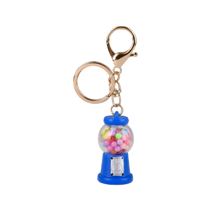 Gumball machine keychain with colorful gumballs on a white background